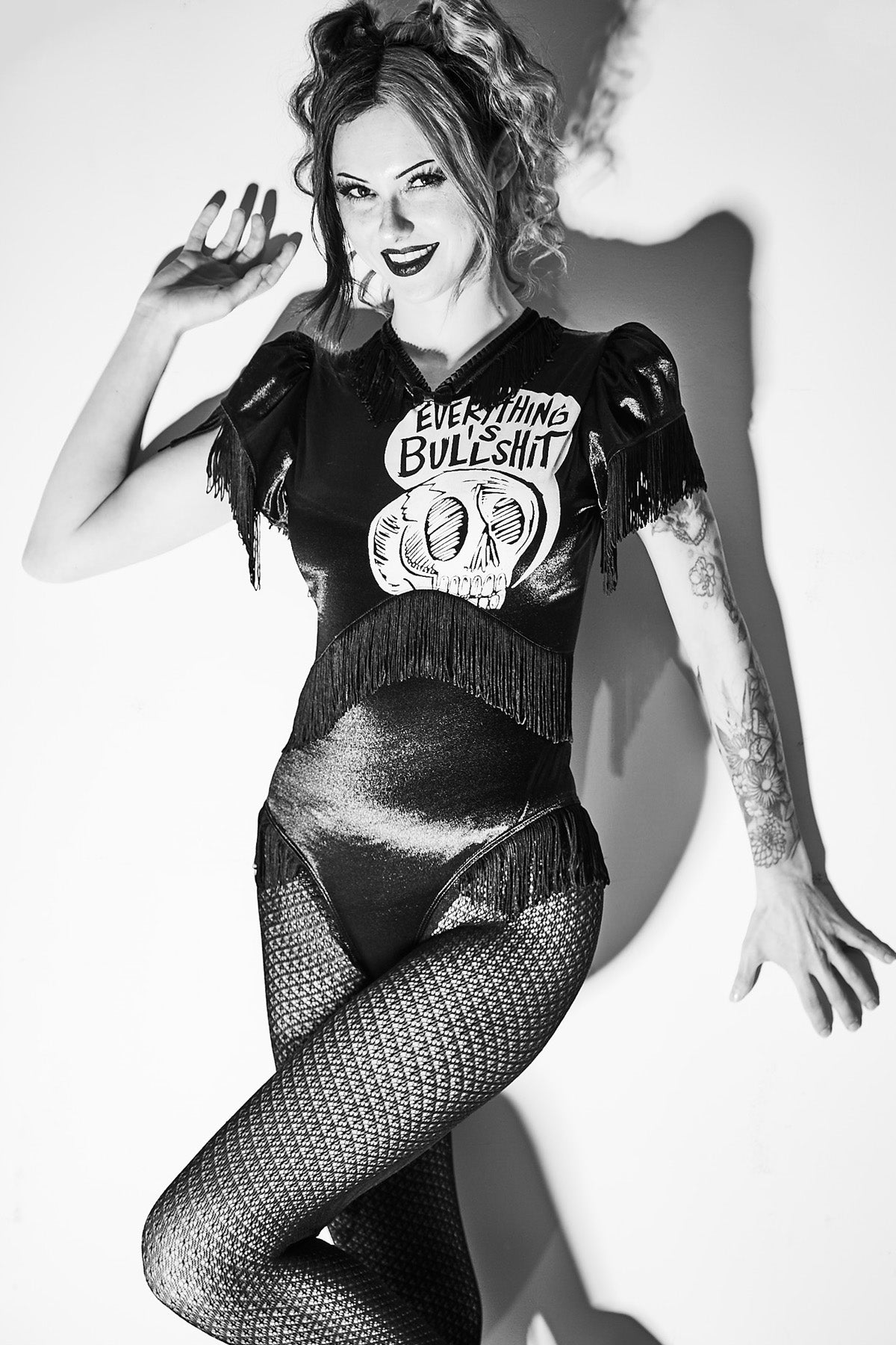 Jessica Louise Everything Is Bullshit Bodysuit in stretch Lycra with chainette fringe and back metal zipper, handmade in Los Angeles